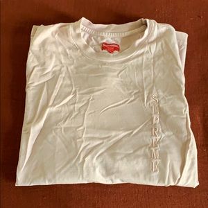 Pale pink long sleeve Supreme Tee